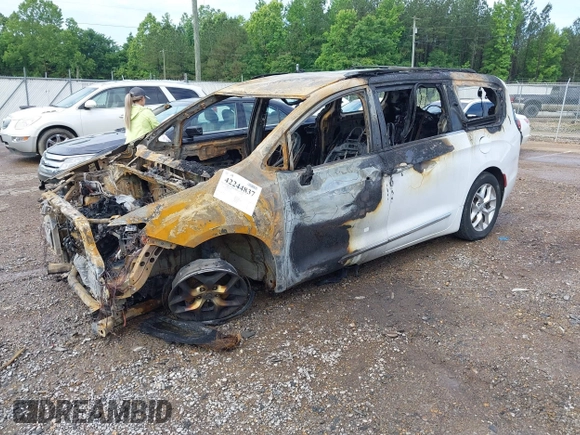 2020 Chrysler Pacifica Touring L with VIN 2C4RC1BG2LR115935, listed as a IAAI auction lot 42244837 with Not provided miles and . Bid and sale history available at DreamBid. Image 2.