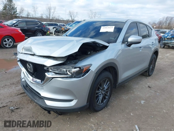 2020 Mazda CX-5 Touring with VIN JM3KFACM5L0768371, listed as a IAAI auction lot 41862623 with 138,446 mi miles and . Bid and sale history available at carsss.com. Image 17.