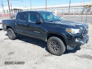 2018 Toyota Tacoma SR5 with VIN 3TMAZ5CN1JM061127, listed as a IAAI auction lot 42012247 with 119,381 mi miles and . Bid and sale history available at DreamBid. Image 1.