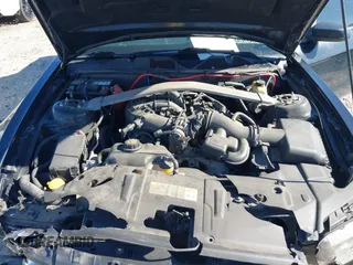 2014 Ford Mustang V6 with VIN 1ZVBP8EM2E5322709, listed as a IAAI auction lot 41732809 with 130,263 mi miles. Bid and sale history available at carsss.com. Image 10.