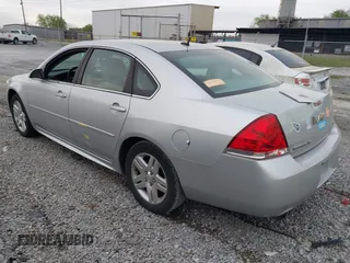 2013 Chevrolet Impala LT with VIN 2G1WG5E34D1251791, listed as a IAAI auction lot 41948414 with 195,204 mi miles and . Bid and sale history available at DreamBid. Image 3.