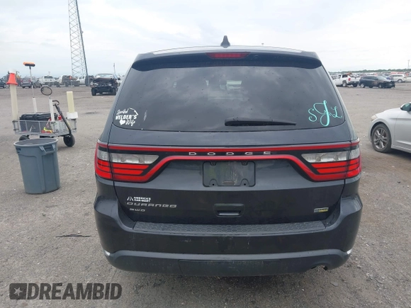 2014 Dodge Durango SXT with VIN 1C4RDJAG7EC307118, listed as a IAAI auction lot 42168781 with 92,977 mi miles and . Bid and sale history available at DreamBid. Image 16.