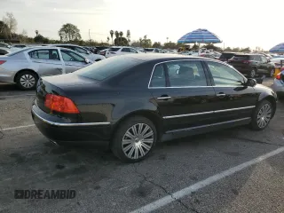 2006 Volkswagen Phaeton z VIN WVWAF03D268002733, wystawiony jako Copart lot #44980475 z przebiegiem 90 539 mil mil oraz Czysty tytuł • Clean title. Historia ofert i sprzedaży dostępna na DreamBid. Obrazek 3.