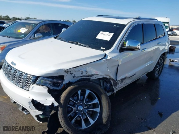2017 Jeep Grand Cherokee Overland with VIN 1C4RJECGXHC636297, listed as a IAAI auction lot 41661922 with 111,477 mi miles. Bid and sale history available at carsss.com. Image 2.