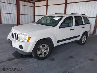 2005 Jeep Grand Cherokee Laredo with VIN 1J4GS48K15C536705, listed as a IAAI auction lot 41800947 with 0 mi miles. Bid and sale history available at carsss.com. Image 2.