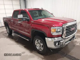 2019 GMC Sierra 2500HD SLT with VIN 1GT12REG4KF277677, listed as a IAAI auction lot 41945948 with 102,041 mi miles and . Bid and sale history available at DreamBid. Image 1.