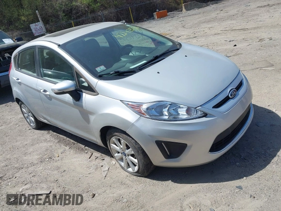 2013 Ford Fiesta SE with VIN 3FADP4EJ3DM136332, listed as a IAAI auction lot 42142556 with 69,979 mi miles and . Bid and sale history available at DreamBid. Image 1.