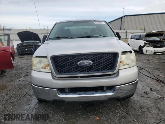 2004 Ford F-150 STX with VIN 1FTRX12W04NB26894, listed as a Copart auction lot 42958345 with 986,965 mi miles and Salvage Title. Bid and sale history available at carsss.com. Image 5.