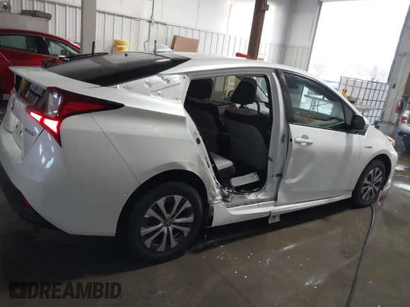 2021 Toyota Prius LE with VIN JTDL9MFU9M3025214, listed as a IAAI auction lot 41375860 with 76,259 mi miles and . Bid and sale history available at DreamBid. Image 14.