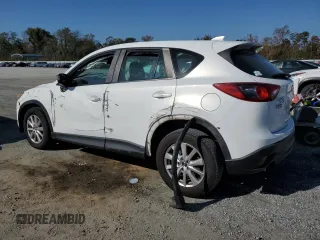 2013 Mazda CX-5 Sport z VIN JM3KE4BEXD0158031, wystawiony jako Copart lot #77827644 z przebiegiem Nie podano mil oraz Szkoda całkowita • Salvage title. Historia ofert i sprzedaży dostępna na DreamBid. Obrazek 2.