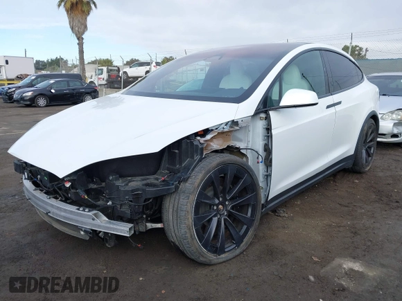 2023 Tesla Model X with VIN 7SAXCBE54PF384403, listed as a IAAI auction lot 40947187 with 16,881 mi miles and . Bid and sale history available at DreamBid. Image 20.