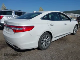 2014 Hyundai Azera with VIN KMHFG4JGXEA345249, listed as a IAAI auction lot 42118221 with 66,567 mi miles and . Bid and sale history available at carsss.com. Image 4.