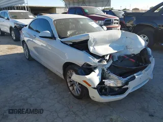 2015 BMW 2 Series 228i with VIN WBA1F5C53FV257086, listed as a IAAI auction lot 40898527 with 83,779 mi miles. Bid and sale history available at carsss.com. Image 1.
