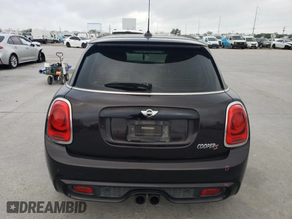 2015 MINI Hardtop 4 Door S with VIN WMWXU3C5XF2B56104, listed as a Copart auction lot 51189075 with 113,586 mi miles and Salvage title. Bid and sale history available at DreamBid. Image 6.