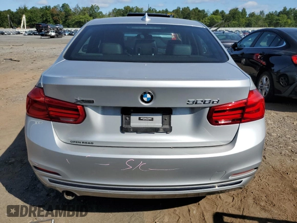 2018 BMW 3 Series with VIN WBA8F1C59JK898499, listed as a Copart auction lot 68247874 with 107,189 mi miles and Salvage title. Bid and sale history available at DreamBid. Image 6.