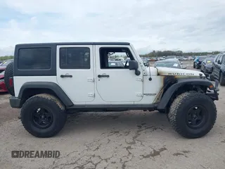 2012 Jeep Wrangler Unlimited Call of Duty MW3 with VIN 1C4BJWFG2CL279645, listed as a IAAI auction lot 41913375 with 1 mi miles. Bid and sale history available at carsss.com. Image 12.