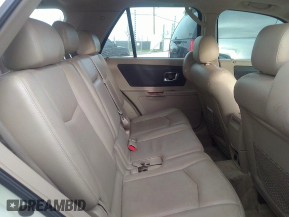 2004 Cadillac SRX with VIN 1GYEE63A040146994, listed as a IAAI auction lot 35501334 with 206,073 mi miles. Bid and sale history available at carsss.com. Image 8.