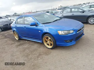 2010 Mitsubishi Lancer GTS with VIN JA32X8HW3AU011482, listed as a IAAI auction lot 41521067 with 186,620 mi miles. Bid and sale history available at carsss.com. Image 1.