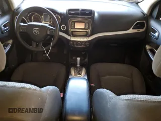 2014 Dodge Journey American Value with VIN 3C4PDCAB2ET301688, listed as a Copart auction lot 54731275 with 108,064 mi miles and Salvage Title. Bid and sale history available at DreamBid. Image 8.