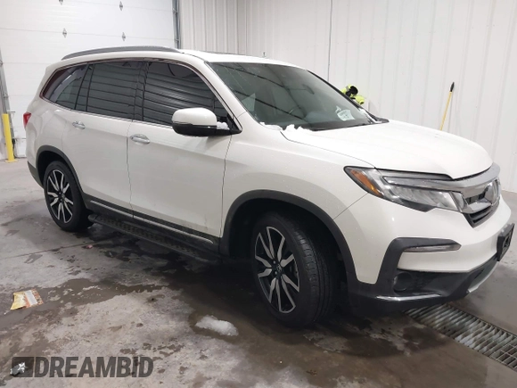 2019 Honda Pilot Touring 7-Passenger with VIN 5FNYF6H64KB005798, listed as a IAAI auction lot 41551933 with 103,151 mi miles. Bid and sale history available at carsss.com. Image 1.