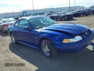 2004 Ford Mustang Standard with VIN 1FAFP40694F149517, listed as a IAAI auction lot 41900595 with 90,806 mi miles. Bid and sale history available at carsss.com. Image 1.