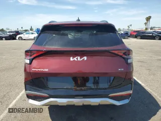 2025 Kia Sportage SX-Prestige with VIN KNDPXCDG3S7201016, listed as a Copart auction lot 49874455 with 1,377 mi miles and Salvage title. Bid and sale history available at DreamBid. Image 6.