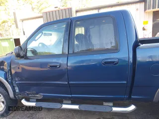 2002 Ford F-150 XLT with VIN 1FTRW086X2KE17566, listed as a IAAI auction lot 41721236 with 98,524 mi miles. Bid and sale history available at carsss.com. Image 14.