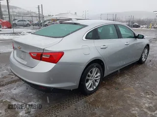 2018 Chevrolet Malibu LT z VIN 1G1ZD5STXJF269890, wystawiony jako IAAI lot #41504935 z przebiegiem 107 190 mil mil oraz . Historia ofert i sprzedaży dostępna na DreamBid. Obrazek 4.