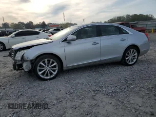 2014 Cadillac XTS Luxury with VIN 2G61M5S39E9118593, listed as a Copart auction lot 50868565 with 179,065 mi miles and Salvage Title. Bid and sale history available at carsss.com. Image 1.
