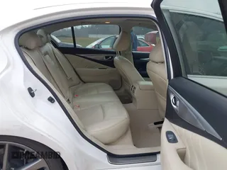 2015 Infiniti Q50 Premium with VIN JN1BV7AP3FM349396, listed as a IAAI auction lot 41793057 with 133,372 mi miles. Bid and sale history available at carsss.com. Image 8.