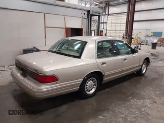 1997 Mercury Grand Marquis LS with VIN 2MELM75W2VX692003, listed as a IAAI auction lot 41547614 with 148,499 mi miles and . Bid and sale history available at DreamBid. Image 4.