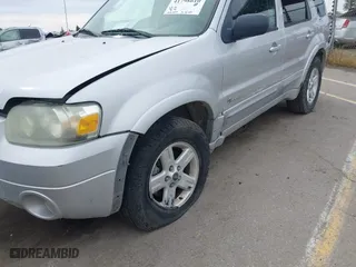2005 Ford Escape Hybrid with VIN 1FMCU95H05KC95225, listed as a IAAI auction lot 41798610 with 216,659 mi miles. Bid and sale history available at carsss.com. Image 6.