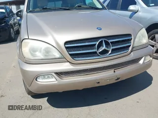 2002 Mercedes-Benz M 320/430/500 with VIN 4JGAB75E52A302663, listed as a IAAI auction lot 41865160 with 231,223 mi miles and . Bid and sale history available at DreamBid. Image 12.