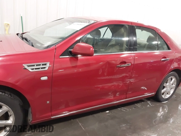 2008 Cadillac STS RWD z VIN 1G6DW67VX80125610, wystawiony jako IAAI lot #42280815 z przebiegiem 207 192 mil mil oraz . Historia ofert i sprzedaży dostępna na DreamBid. Obrazek 6.