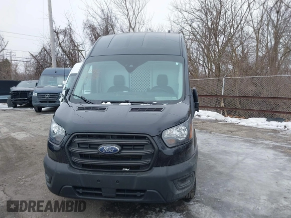 2020 Ford Transit Cargo with VIN 1FTBR3XG1LKB79029, listed as a IAAI auction lot 41483908 with 147,801 mi miles and . Bid and sale history available at DreamBid. Image 6.