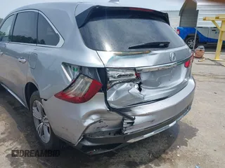 2020 Acura MDX with VIN 5J8YD4H3XLL003859, listed as a IAAI auction lot 42502948 with 66,839 mi miles and . Bid and sale history available at DreamBid. Image 6.