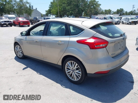 2017 Ford Focus Titanium с VIN 1FADP3N21HL327581, выставлен на аукционе IAAI как лот 42342179 с пробегом 61 489 миль миль и . История ставок и продаж доступна на DreamBid. Изображение 3.