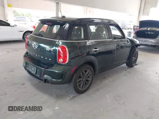 2013 MINI Countryman S with VIN WMWZC3C56DWP24170, listed as a IAAI auction lot 42366594 with 143,311 mi miles and . Bid and sale history available at DreamBid. Image 4.