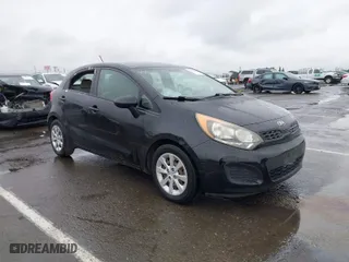 2013 Kia Rio LX with VIN KNADM5A35D6302623, listed as a IAAI auction lot 41626083 with 114,132 mi miles. Bid and sale history available at carsss.com. Image 1.