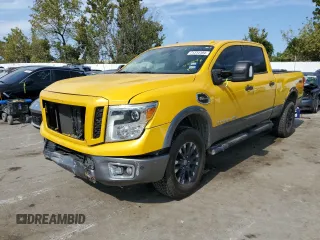 2016 Nissan Titan XD S with VIN 1N6AA1F4XGN507919, listed as a Copart auction lot 71314104 with 146,509 mi miles and Salvage Title. Bid and sale history available at carsss.com. Image 1.
