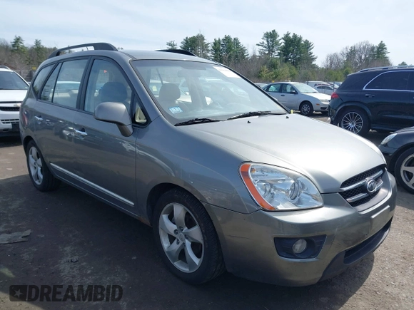 2009 Kia Rondo LX with VIN KNAFG526697274941, listed as a IAAI auction lot 41964802 with 180,941 mi miles. Bid and sale history available at carsss.com. Image 1.