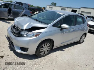 2015 Honda Fit LX with VIN 3HGGK5H52FM738587, listed as a Copart auction lot 61231705 with 134,623 mi miles and Salvage title. Bid and sale history available at DreamBid. Image 1.