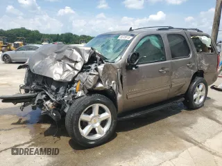 2013 Chevrolet Tahoe LT with VIN 1GNSKBE04DR260000, listed as a Copart auction lot 59749615 with Not provided miles and Salvage title. Bid and sale history available at DreamBid. Image 1.