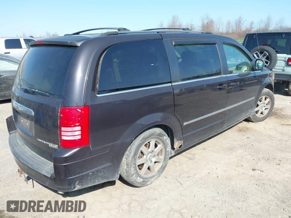 2010 Chrysler Town & Country Touring with VIN 2A4RR5DX5AR360173, listed as a IAAI auction lot 42082140 with 133,366 mi miles. Bid and sale history available at carsss.com. Image 4.