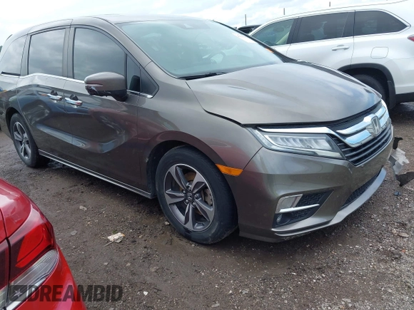 2019 Honda Odyssey Touring with VIN 5FNRL6H81KB038790, listed as a IAAI auction lot 42200190 with 131,761 mi miles and . Bid and sale history available at DreamBid. Image 1.