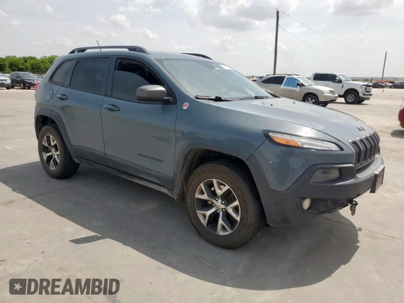 2014 Jeep Cherokee Trailhawk with VIN 1C4PJMBS0EW185737, listed as a Copart auction lot 63463015 with 199,983 mi miles and Clean title. Bid and sale history available at DreamBid. Image 4.