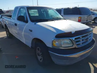 1999 Ford F-150 with VIN 1FTZX1724XKB41653, listed as a IAAI auction lot 41267645 with 114,075 mi miles and . Bid and sale history available at DreamBid. Image 1.