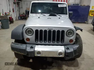 2008 Jeep Wrangler Unlimited Sahara with VIN 1J4GA59148L652001, listed as a Copart auction lot 48599655 with 161,436 mi miles and Clean title. Bid and sale history available at DreamBid. Image 5.