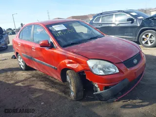 2008 Kia Rio LX with VIN KNADE123486387187, listed as a IAAI auction lot 41770395 with 113,663 mi miles. Bid and sale history available at carsss.com. Image 1.