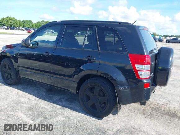 2006 Suzuki Grand Vitara Luxury z VIN JS3TD947664104590, wystawiony jako IAAI lot #42798282 z przebiegiem 146 725 mil mil oraz . Historia ofert i sprzedaży dostępna na DreamBid. Obrazek 3.